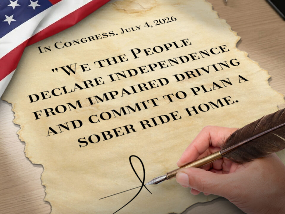 An American flag, car keys, and an individual signing a declaration of independence from impaired driving. Buzzed driving is drunk driving.